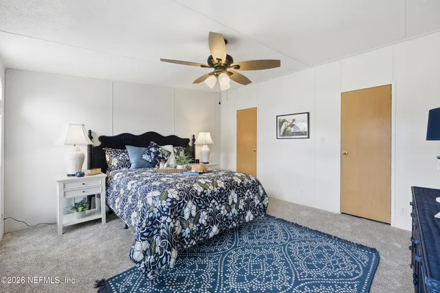a living room with furniture and a toilet