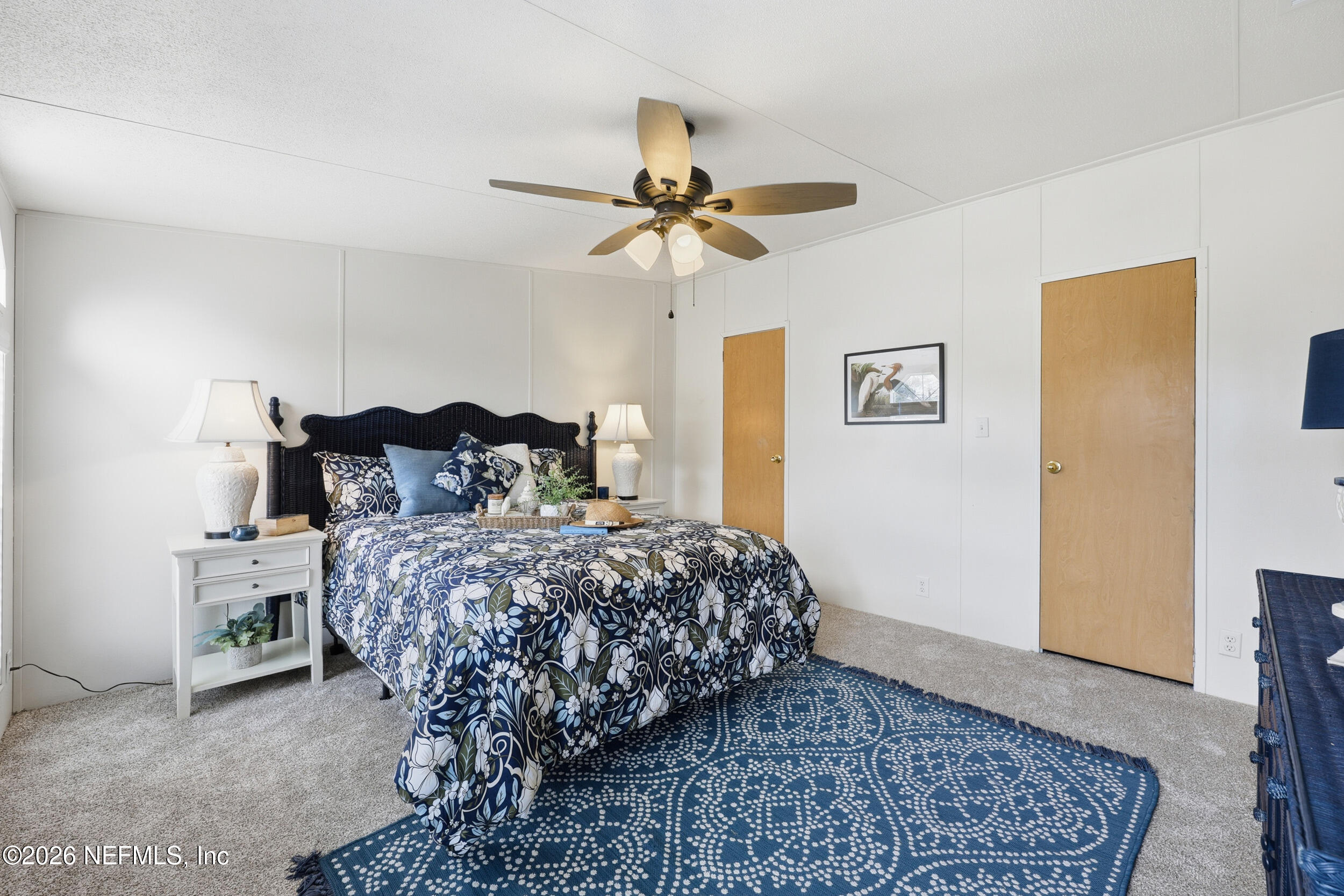 116 Waterside Avenue Satsuma, FL 32189 - Photo 19 of 53 a bedroom with a bed and a window