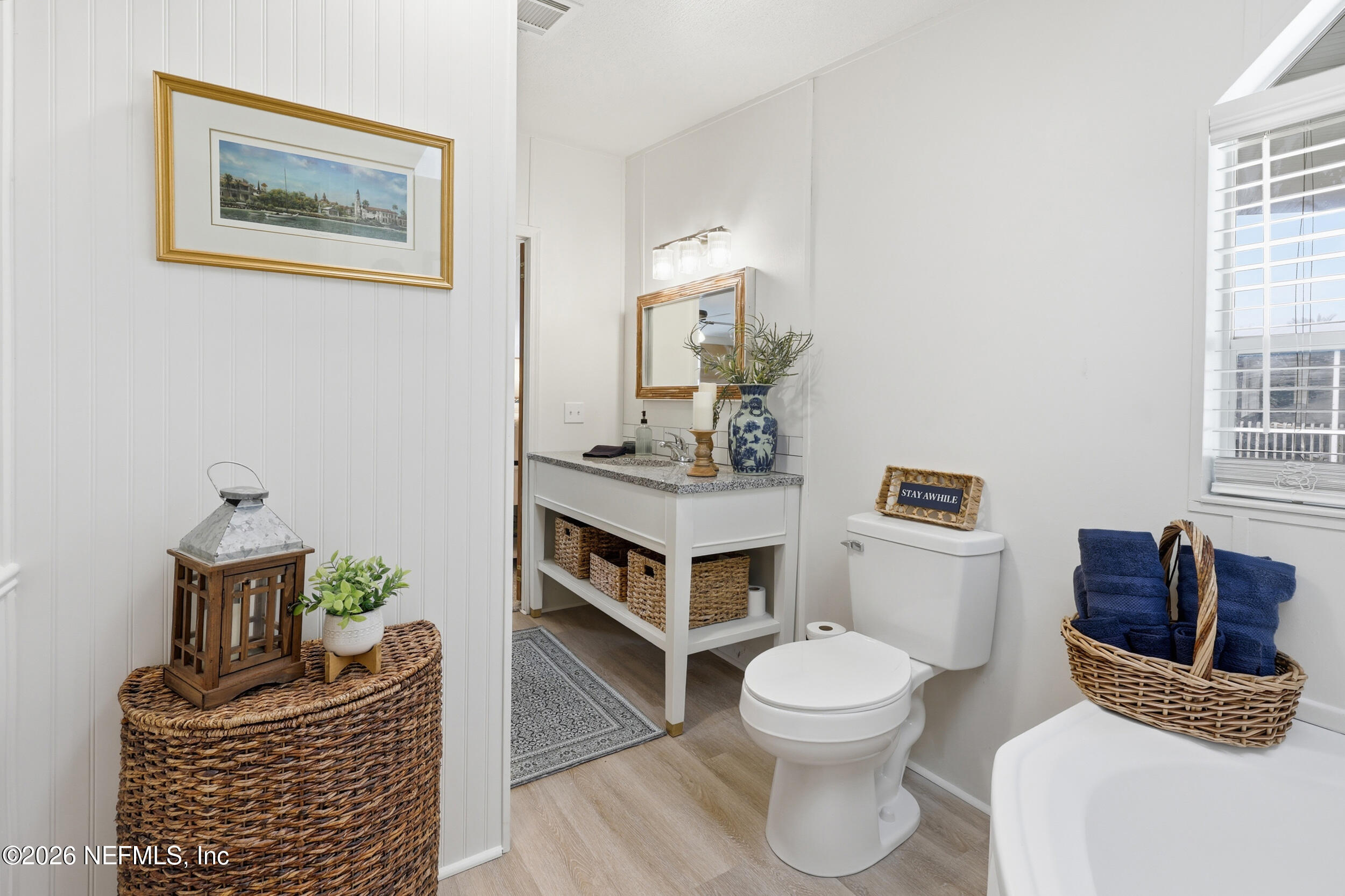 116 Waterside Avenue Satsuma, FL 32189 - Photo 21 of 53 a living room with furniture and a toilet