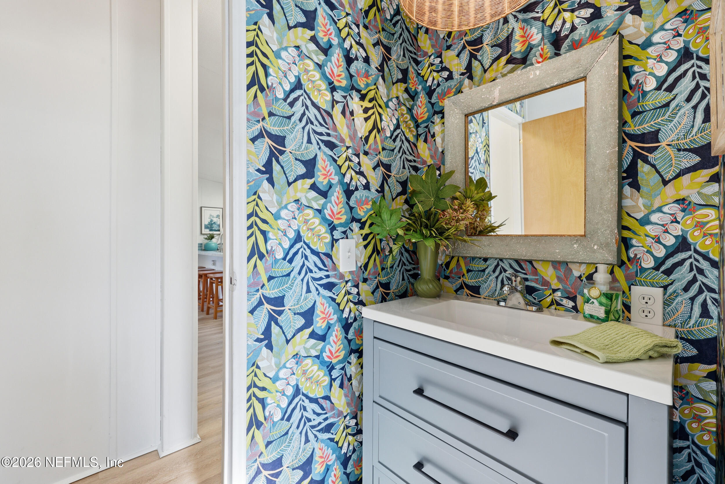 116 Waterside Avenue Satsuma, FL 32189 - Photo 31 of 53 a bathroom with a sink and a mirror