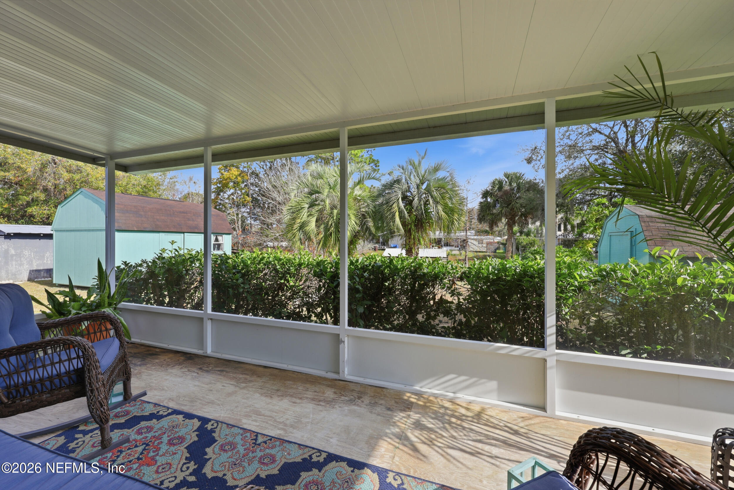 116 Waterside Avenue Satsuma, FL 32189 - Photo 38 of 53 a house view with a sitting space and garden view