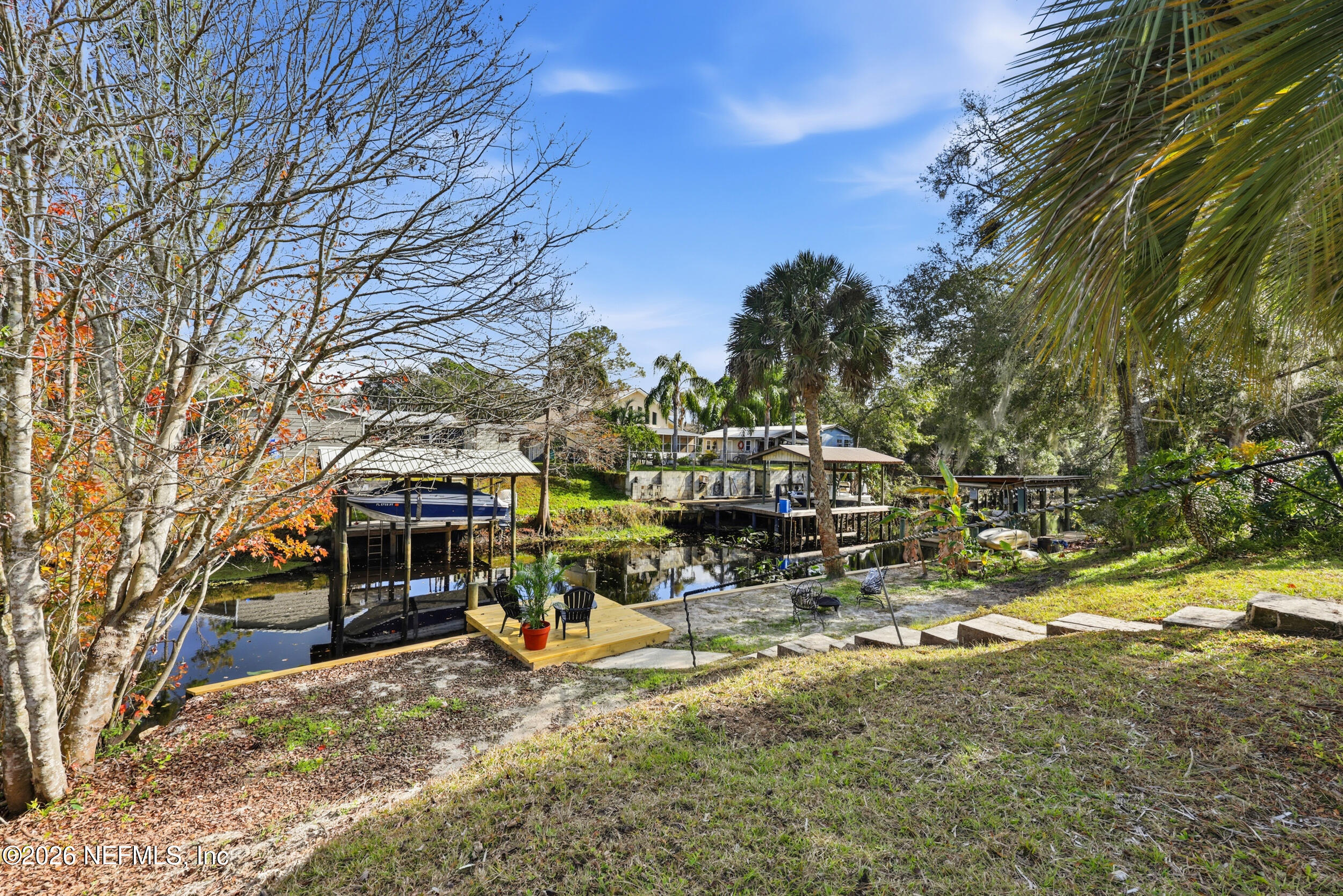 116 Waterside Avenue Satsuma, FL 32189 - Photo 43 of 53 a view of a park with swings and slides