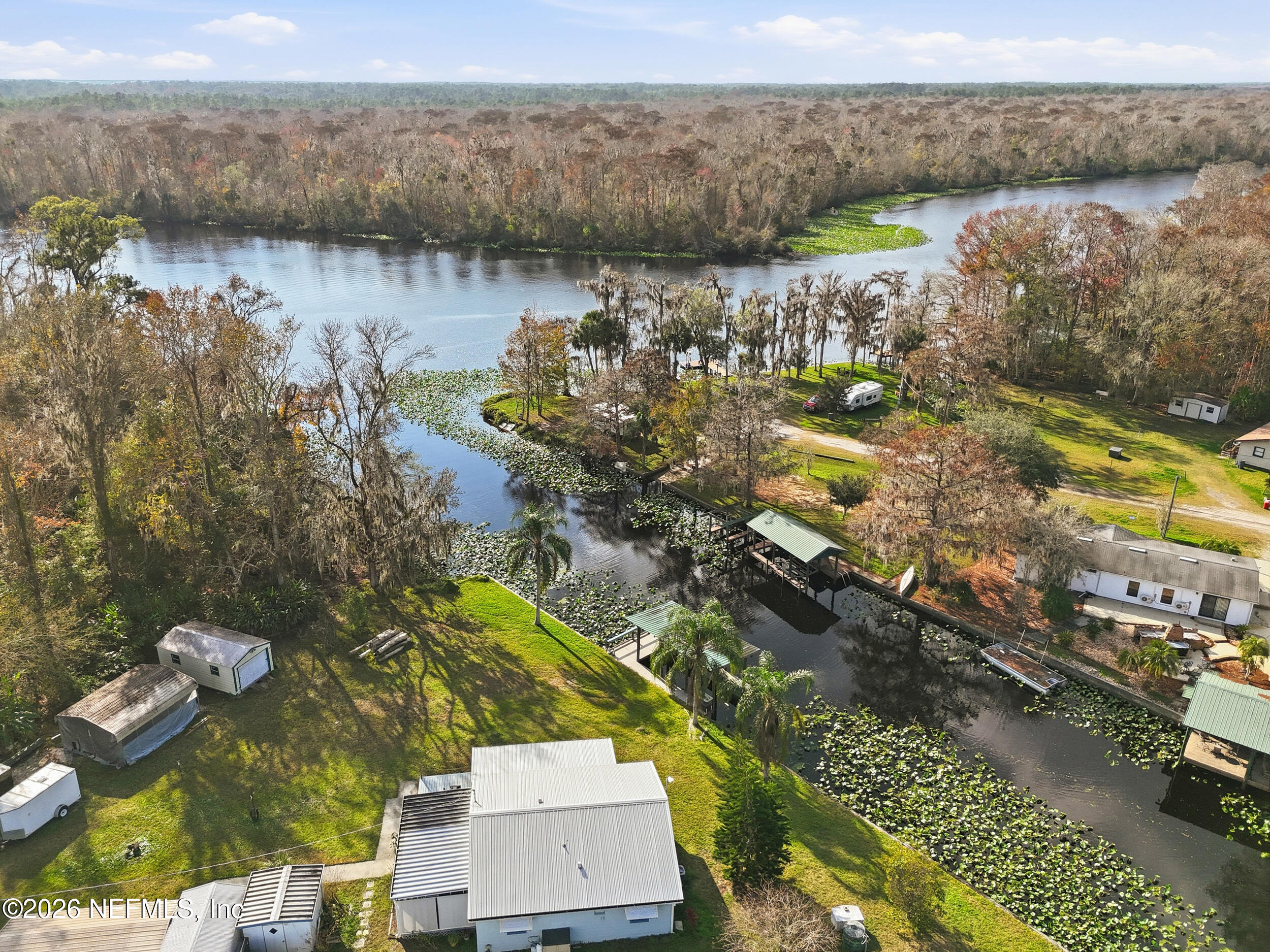 116 Waterside Avenue Satsuma, FL 32189 - Photo 6 of 53 a view of a lake with a mountain