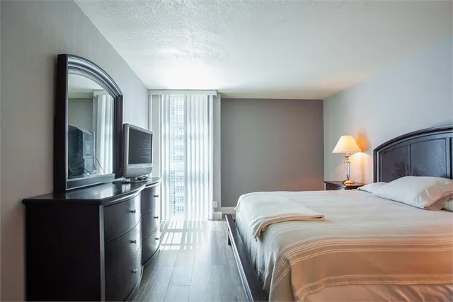 an aerial view of a house with a swimming pool