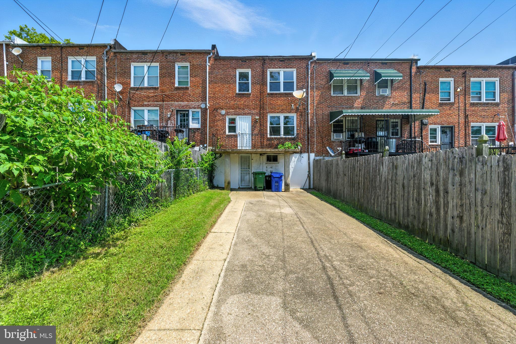 704 Wicklow Road Baltimore, MD 21229 - Photo 3 of 12 a view of multiple houses with a yard