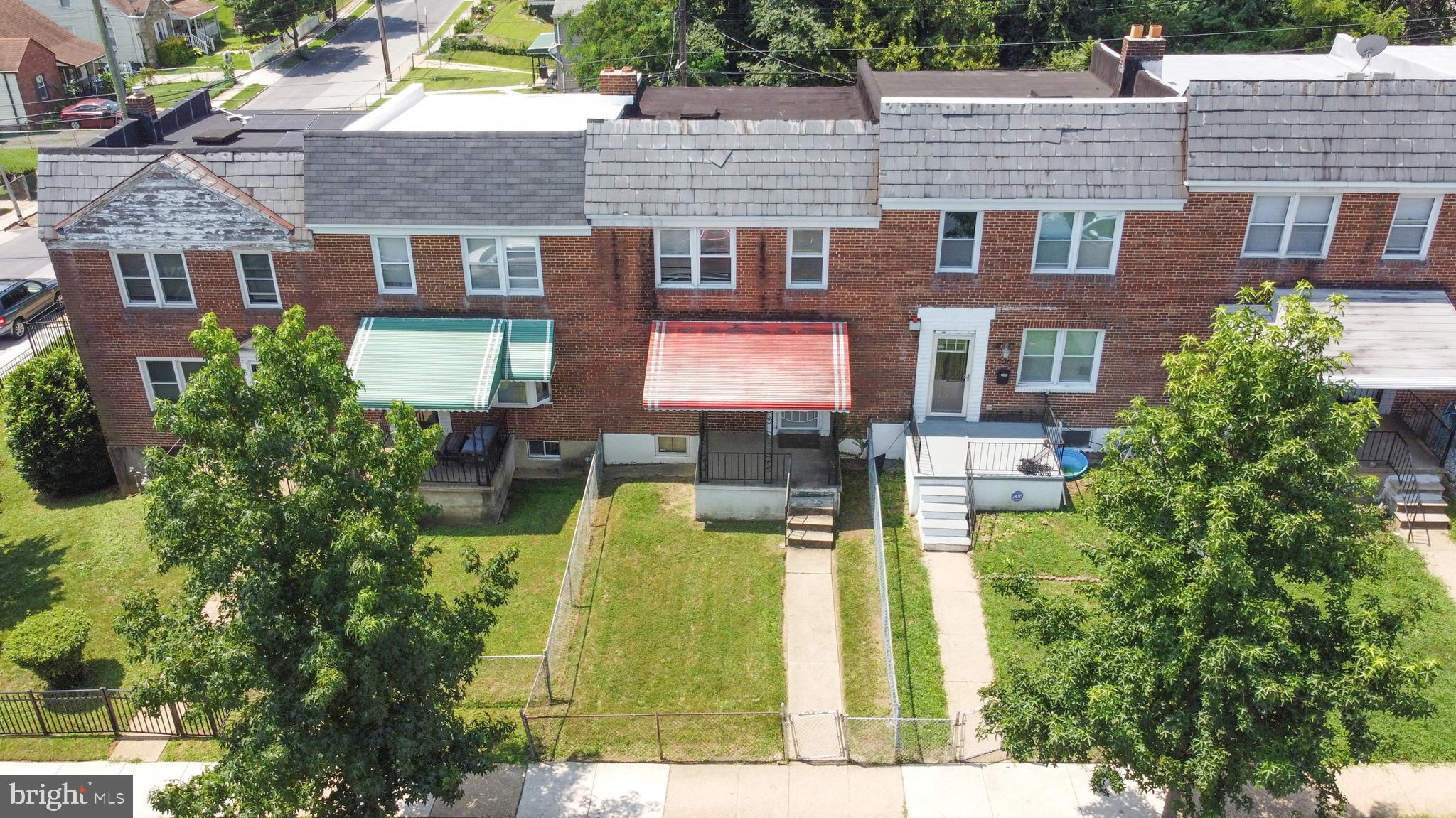 704 Wicklow Road Baltimore, MD 21229 - Photo 5 of 12 a aerial view of a multi story residential apartment building