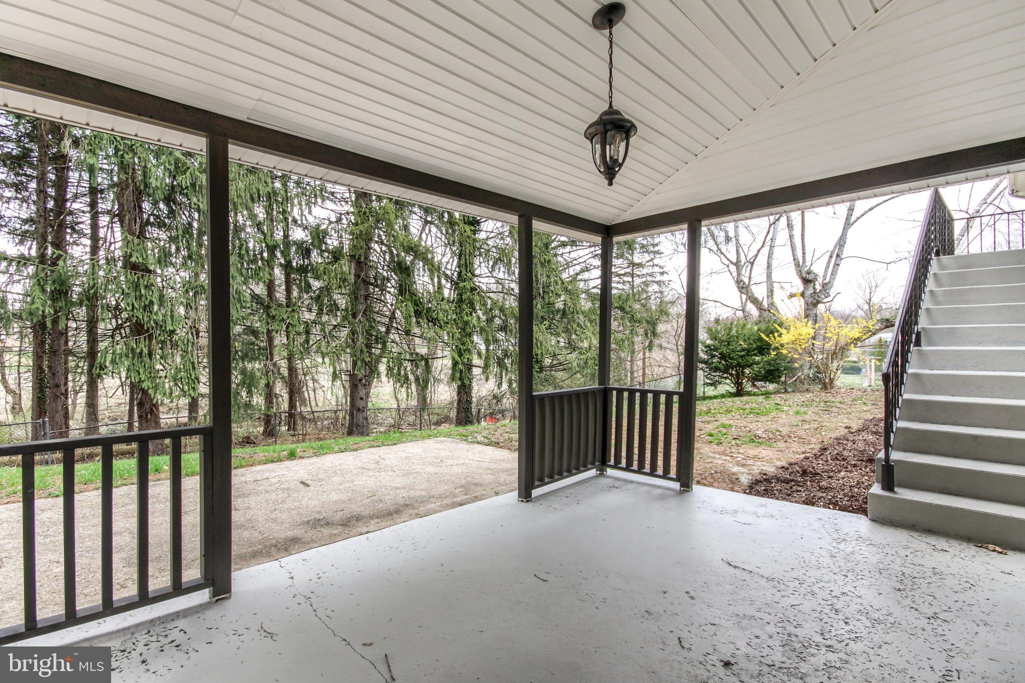 609 Boundbrook Road Harrisburg, PA 17109 - Photo 4 of 42 Covered Patio Steps leading to Kitchen