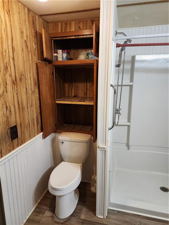 4706 Iowa Street Waco, TX 76705 - Photo 16 of 21 a bathroom with a toilet and a shower