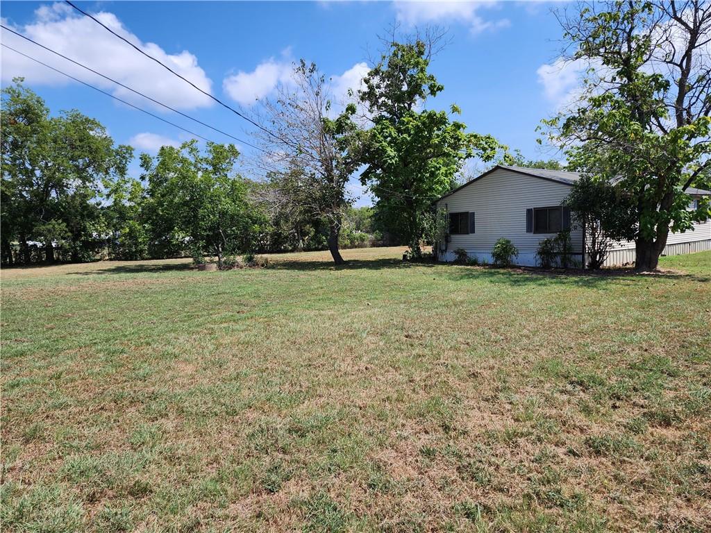 4706 Iowa Street Waco, TX 76705 - Photo 3 of 21 a view of a backyard with a garden
