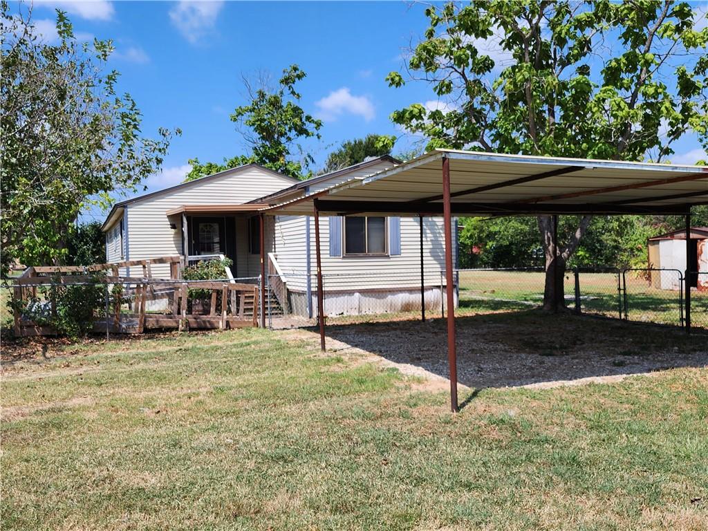 4706 Iowa Street Waco, TX 76705 - Photo 5 of 21 a view of a house with backyard porch and sitting area