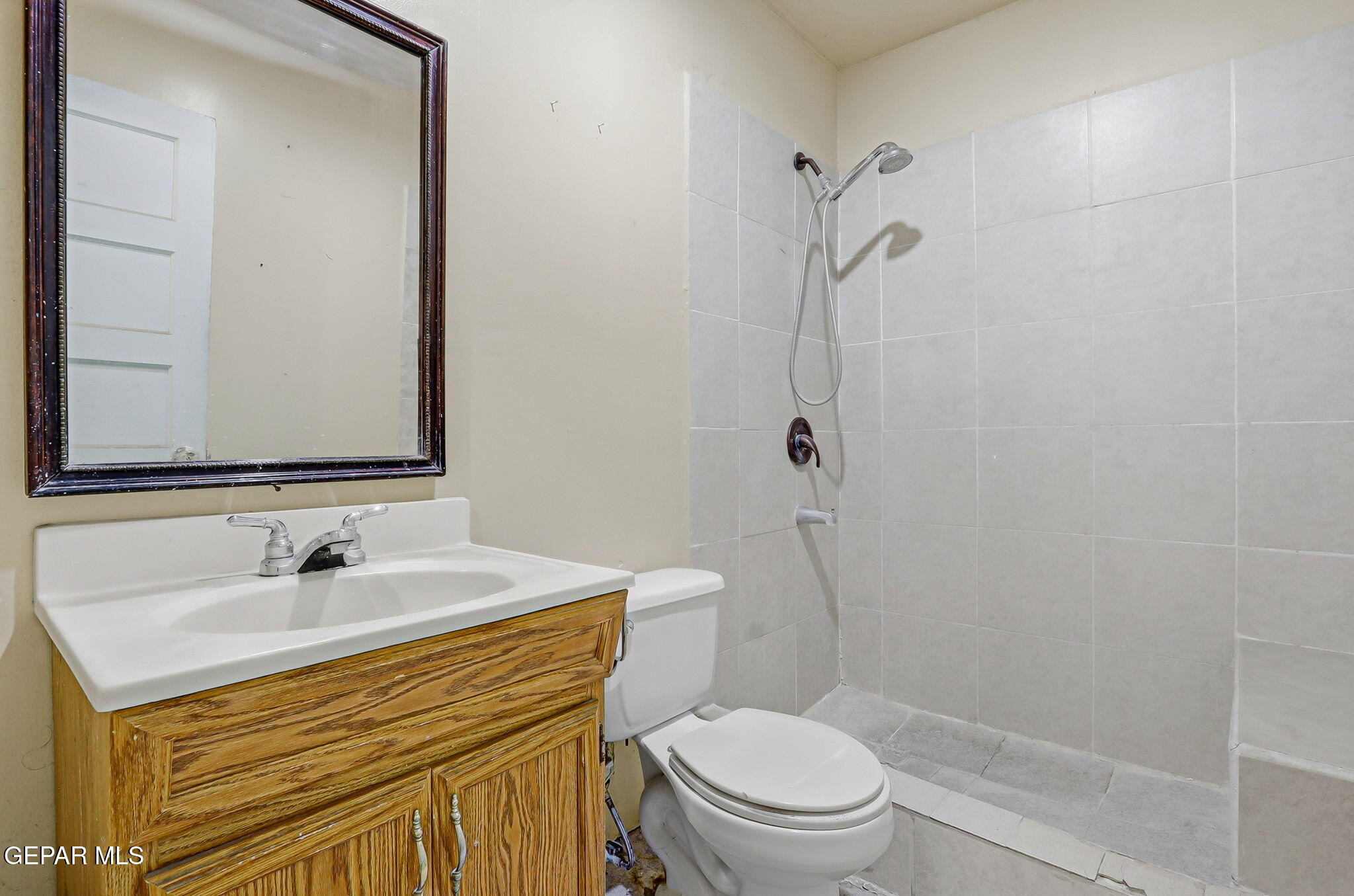 116 Tamarisk Street Anthony, TX 79821 - Photo 16 of 36 a bathroom with a sink toilet and shower