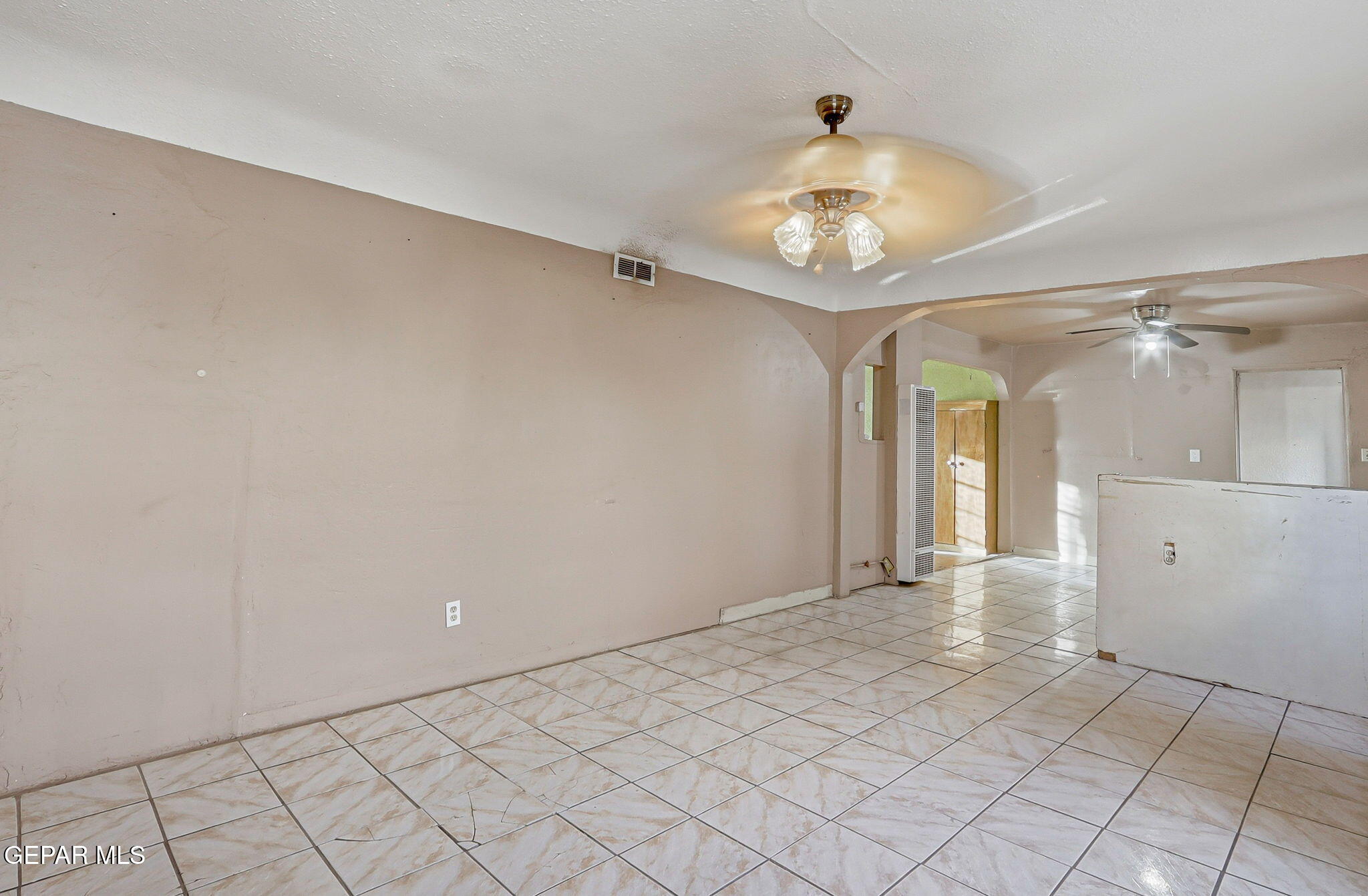 116 Tamarisk Street Anthony, TX 79821 - Photo 5 of 36 a view of an empty room and window