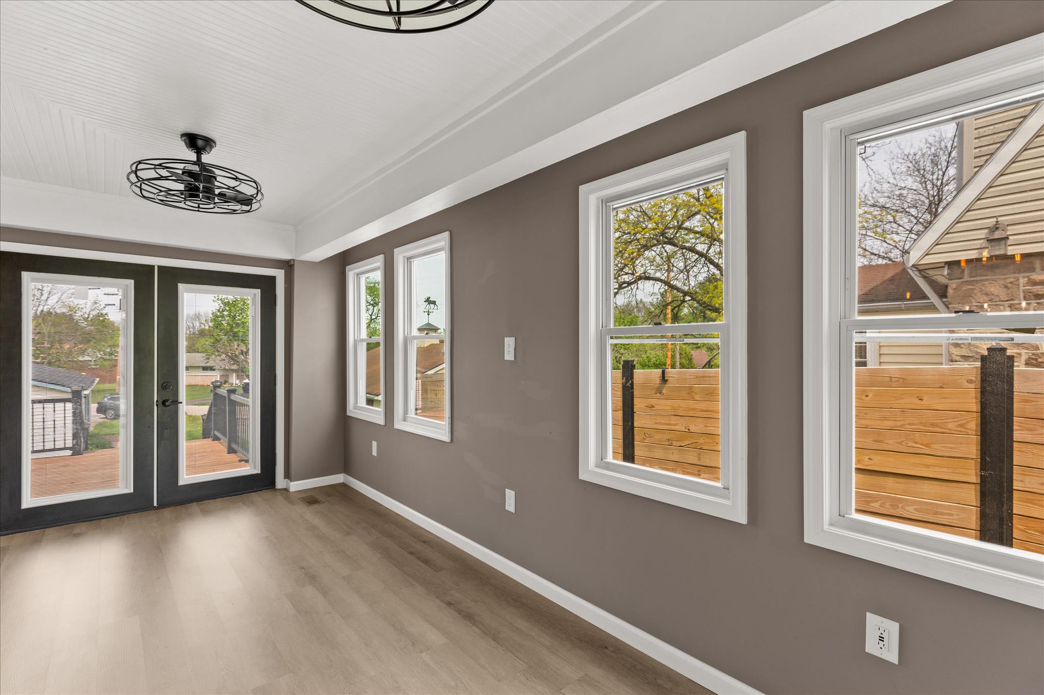 310 Hanover Road York, PA 17408 - Photo 38 of 56 a view of an empty room with a window and wooden floor