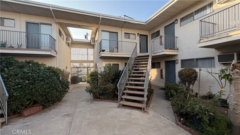 908 Marguerita Avenue, Unit 1 Alhambra, CA 91803 - Photo 11 of 11 a view of a house with many windows and plants