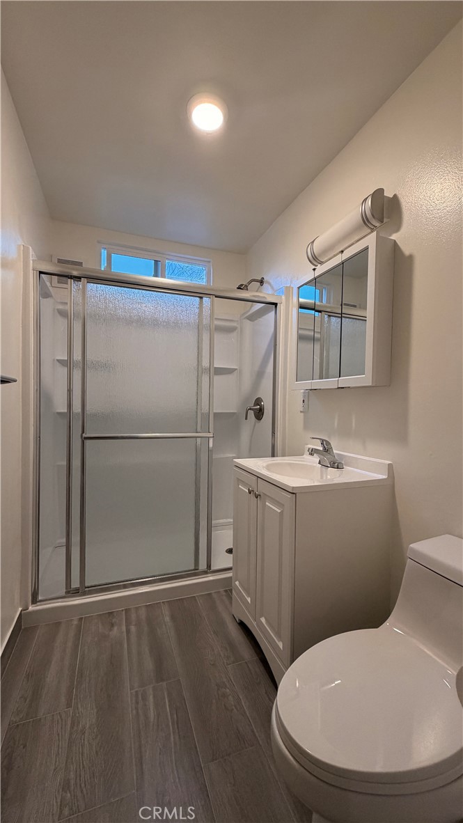 908 Marguerita Avenue, Unit 1 Alhambra, CA 91803 - Photo 8 of 11 a bathroom with a sink toilet and shower
