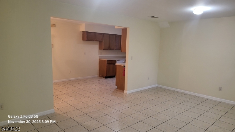 306 1st Street, Unit 1 Elizabeth Port, NJ 07206 - Photo 5 of 23 a view of a storage & utility room with a sink