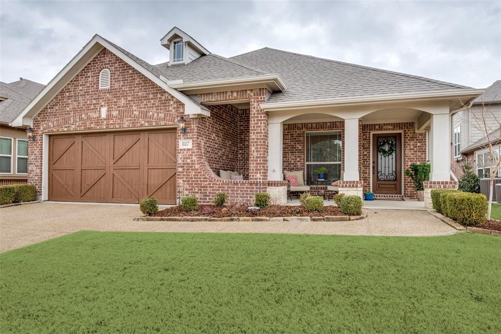 817 Lighthouse Lane Savannah, TX 76227 - Photo 1 of 1 a front view of a house with a yard and porch