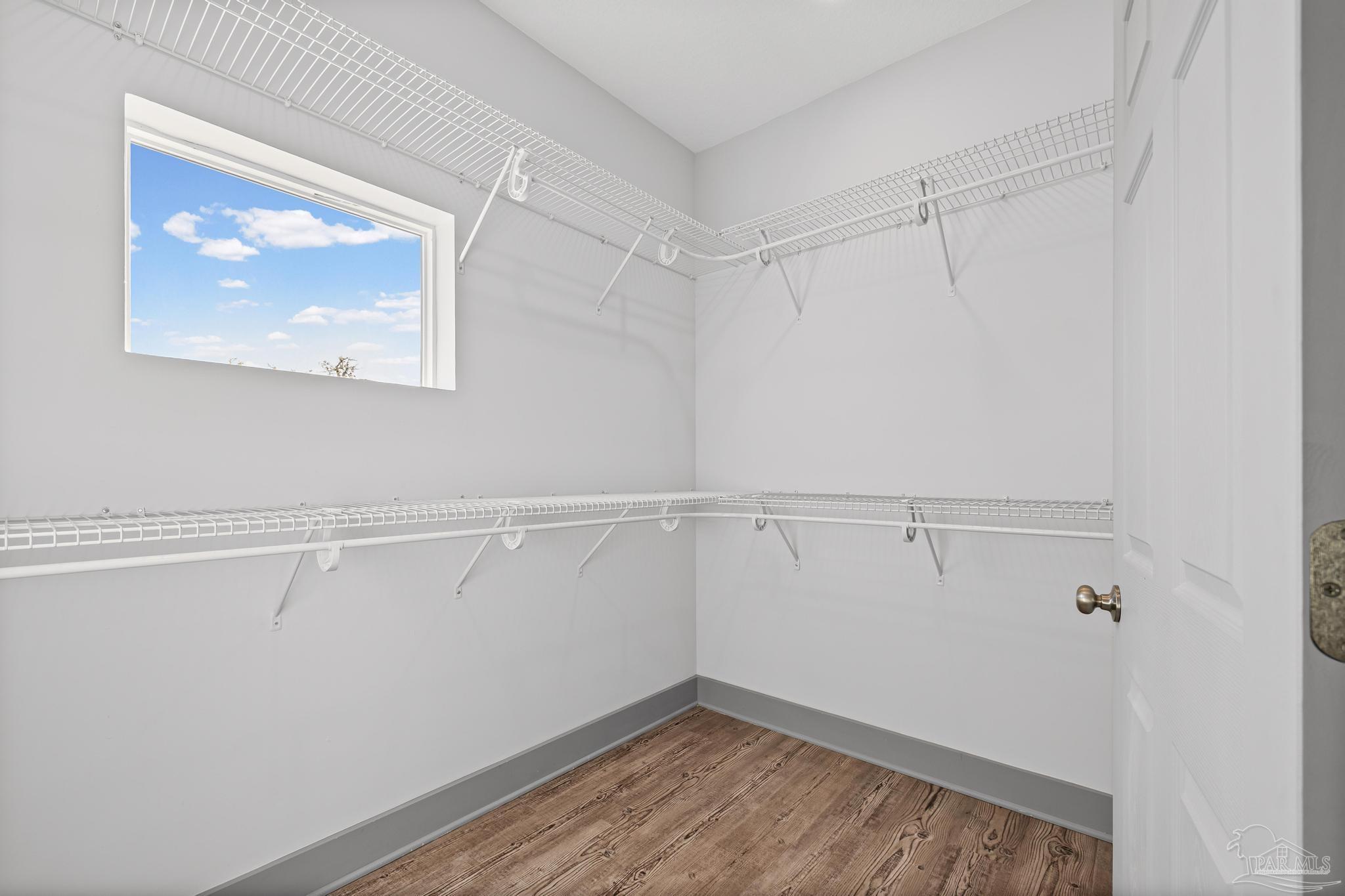 305 Garcon Point Road Milton, FL 32583 - Photo 39 of 72 a view of an empty walk in closet