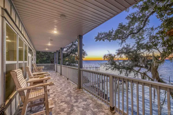 a view of a balcony with an ocean view