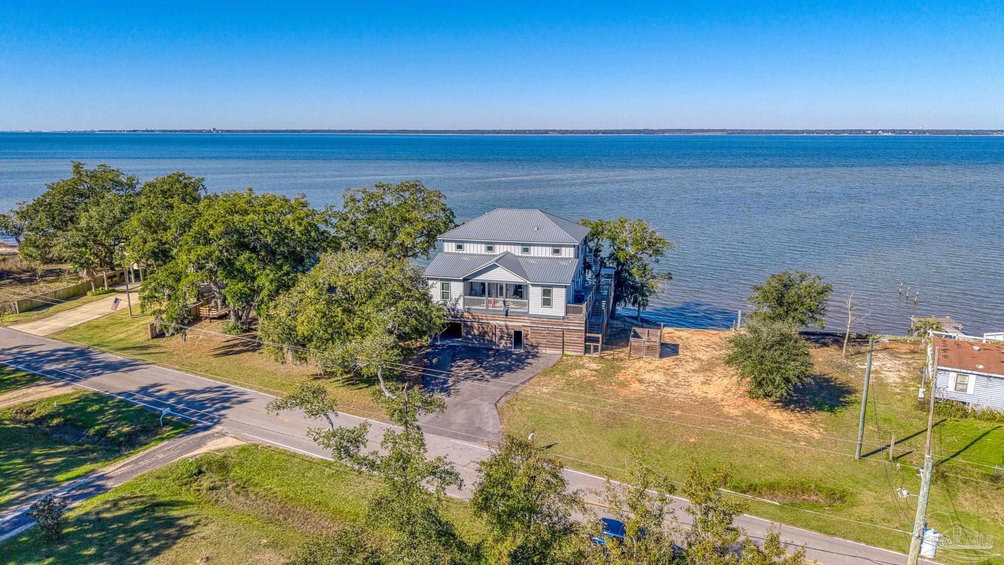 305 Garcon Point Road Milton, FL 32583 - Photo 64 of 72 a view of a city with ocean view