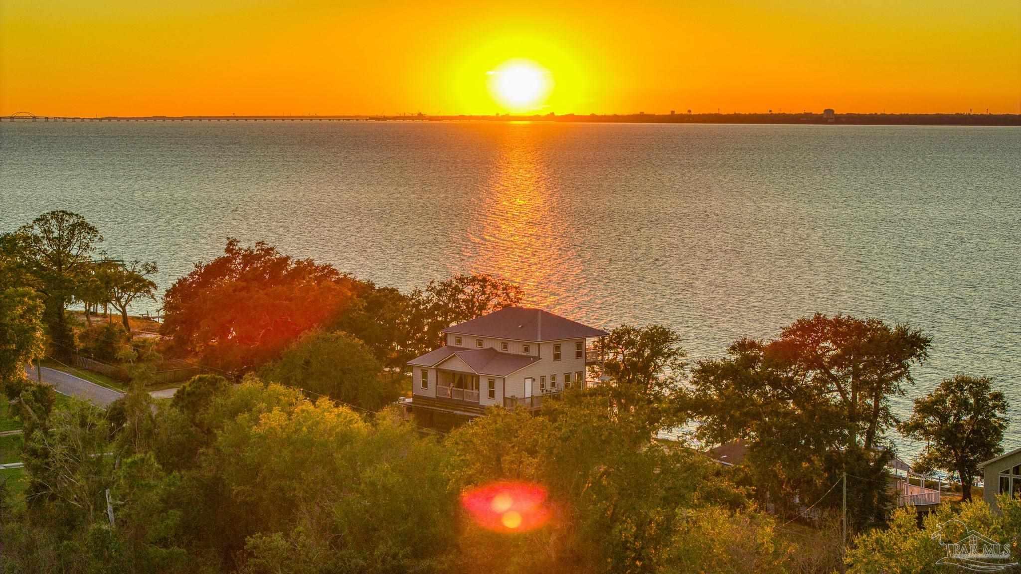 305 Garcon Point Road Milton, FL 32583 - Photo 68 of 72 a view of ocean with a building