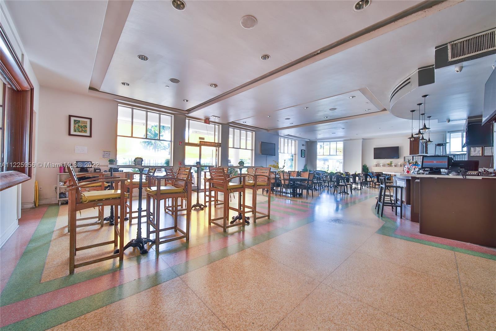Flamingo-Lummus Miami Beach, FL 33139 - Photo 27 of 28 a living room with lots of furniture and a large window