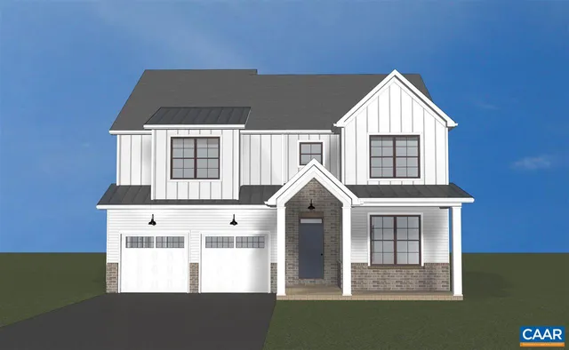 a view of house with backyard