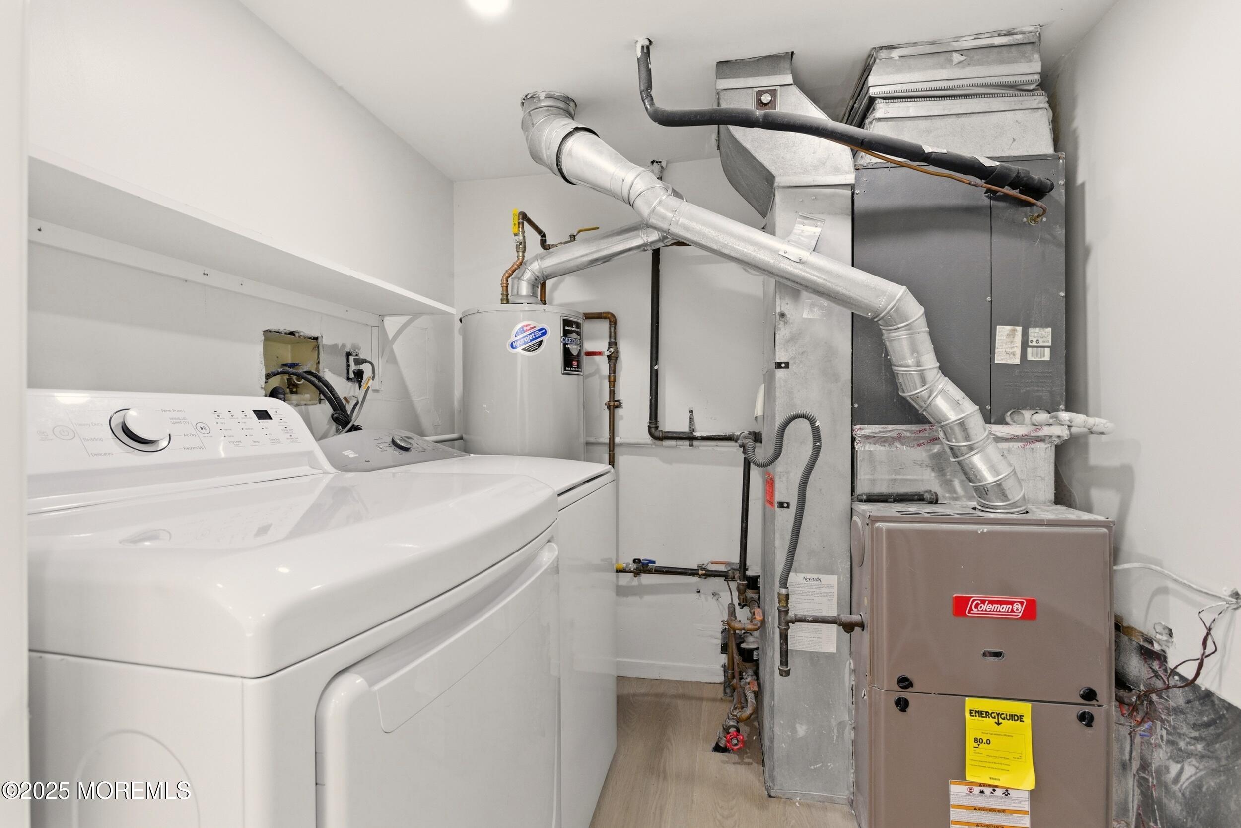 75 Hickory Hill Road Jackson, NJ 08527 - Photo 25 of 30 a utility room with dryer and washer