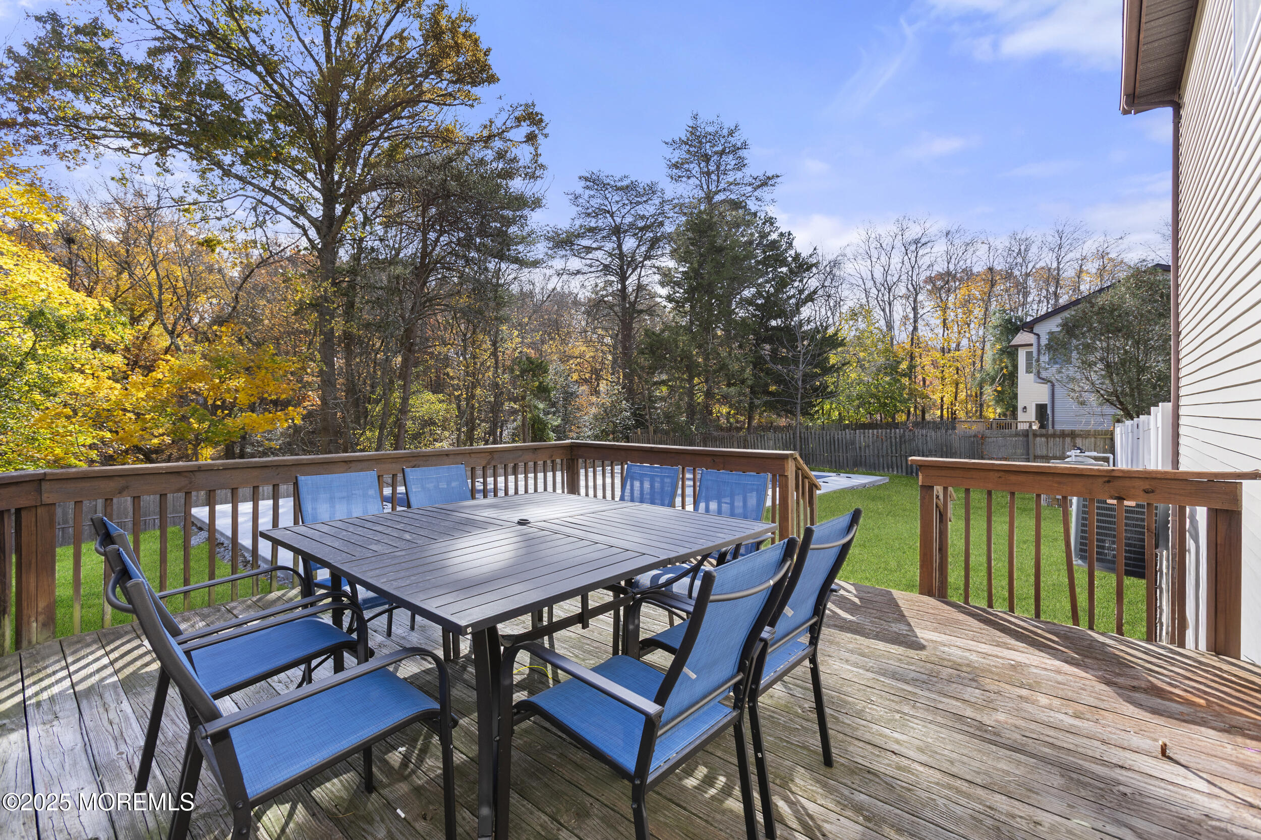 75 Hickory Hill Road Jackson, NJ 08527 - Photo 29 of 30 a roof deck with a table and chairs