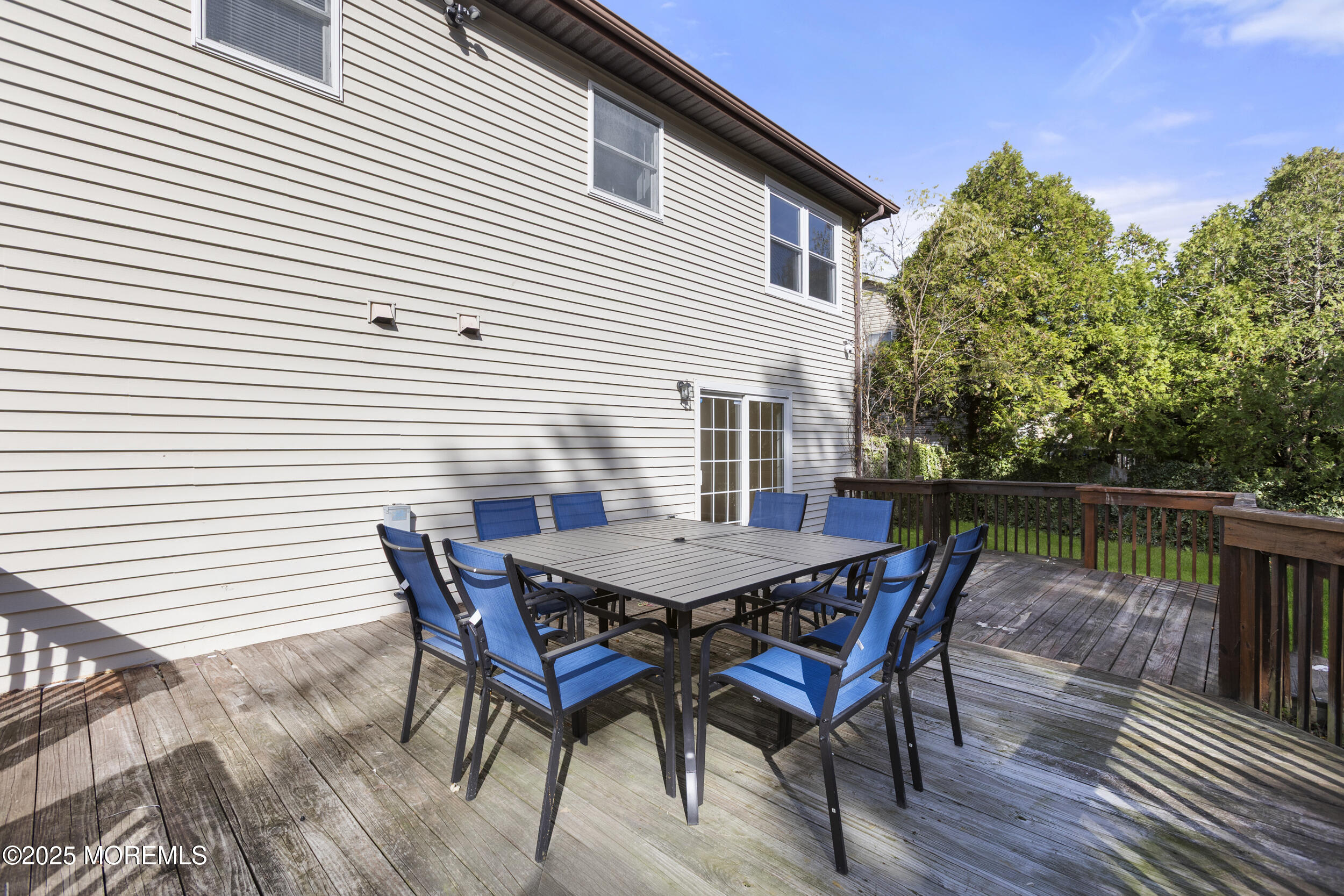 75 Hickory Hill Road Jackson, NJ 08527 - Photo 30 of 30 a view of a deck with a table and chairs with wooden floor and fence