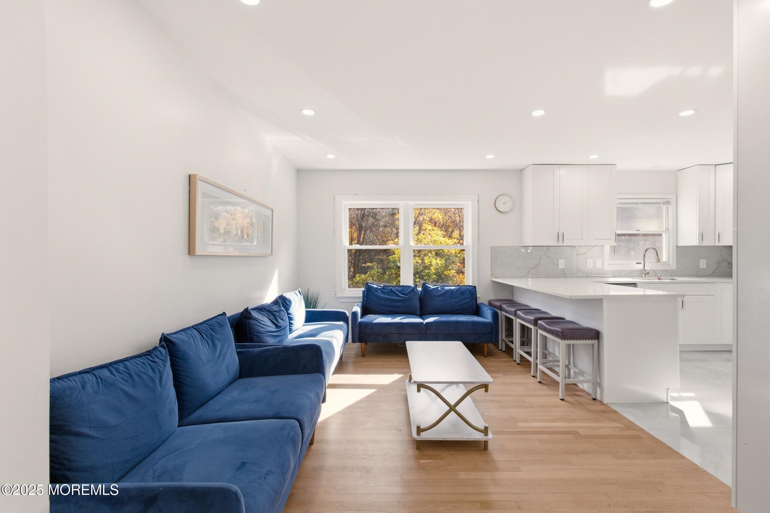 75 Hickory Hill Road Jackson, NJ 08527 - Photo 10 of 30 a living room with furniture and wooden floor