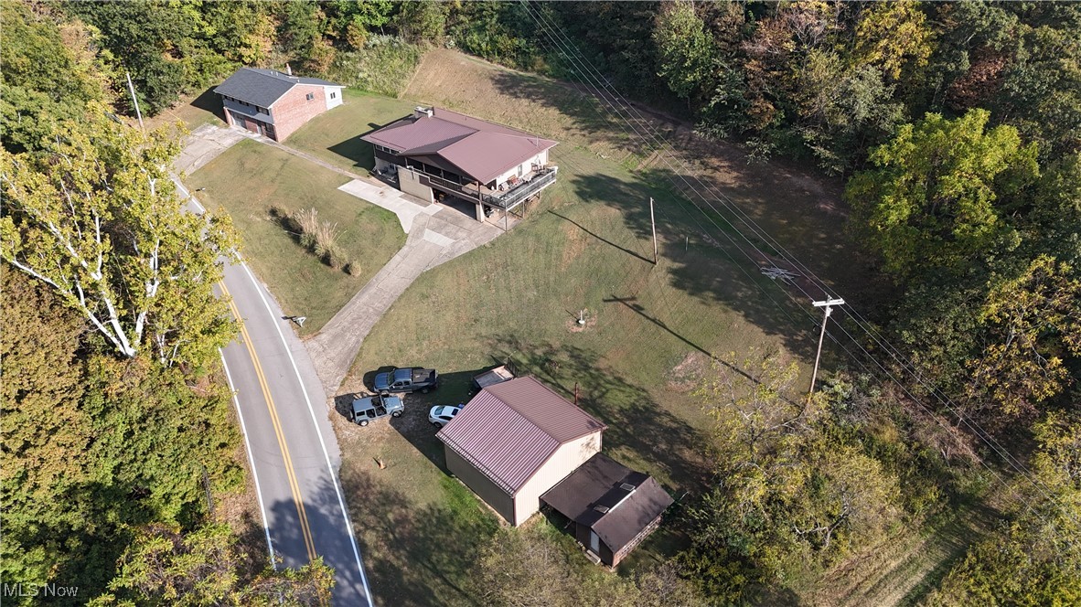 2853 Lake Washington Road Washington, WV 26181 - Photo 30 of 31 aerial view of shed, garage, and house ... 1.19 acres of property!