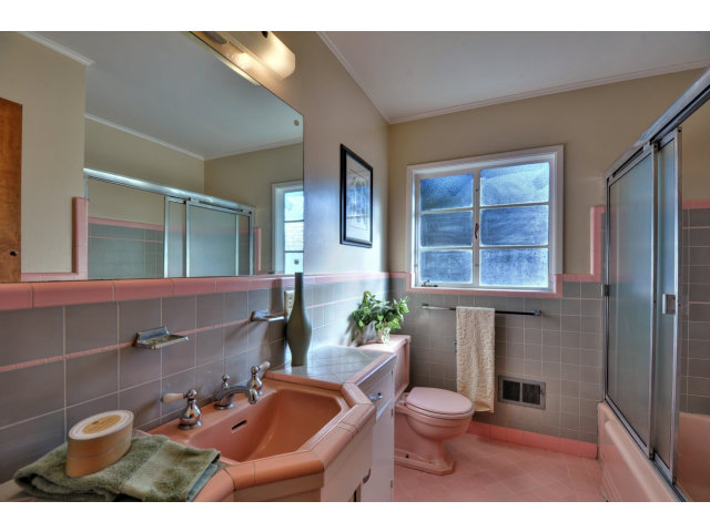 1040 Covington Road Los Altos, CA 94024 - Photo 15 of 19 a bathroom with a toilet a sink and mirror