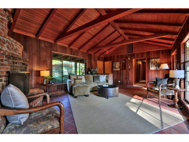 1040 Covington Road Los Altos, CA 94024 - Photo 4 of 19 a living room with patio furniture and a fireplace