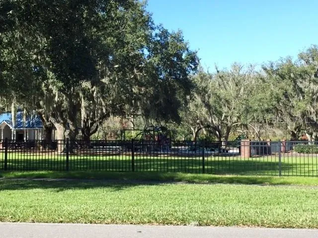 a view of a park and trees