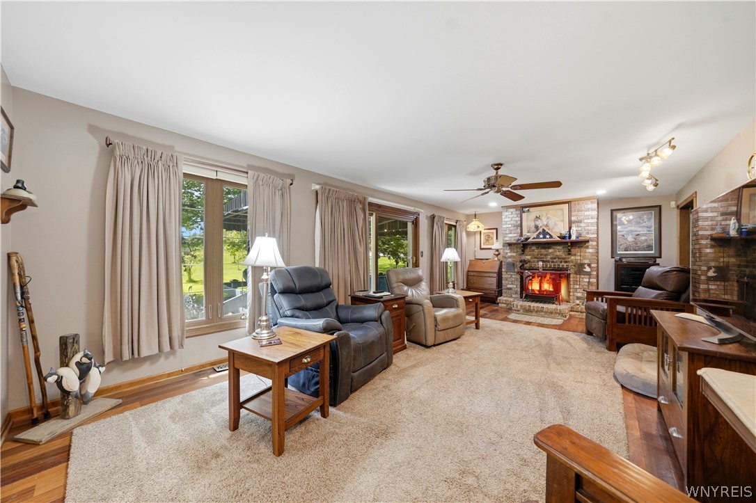 9950 Harper Road Darien, NY 14036 - Photo 34 of 50 Living room with Vermont casting wood stove