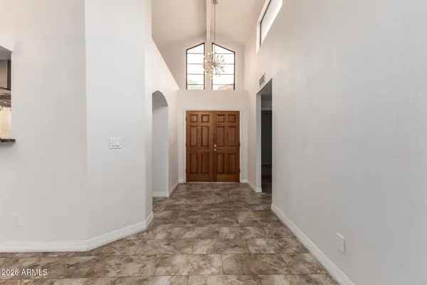 a view of a livingroom with furniture window and wooden floor