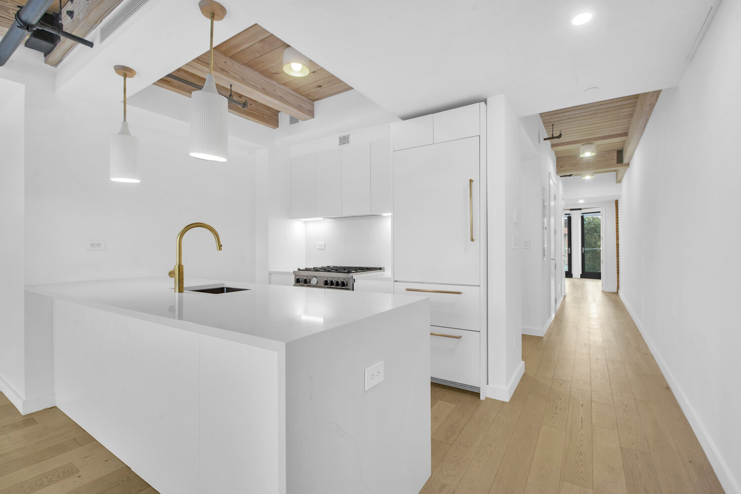 120 Java Street, Unit 4B Brooklyn, NY 11222 - Photo 10 of 48 a kitchen with a sink and a refrigerator