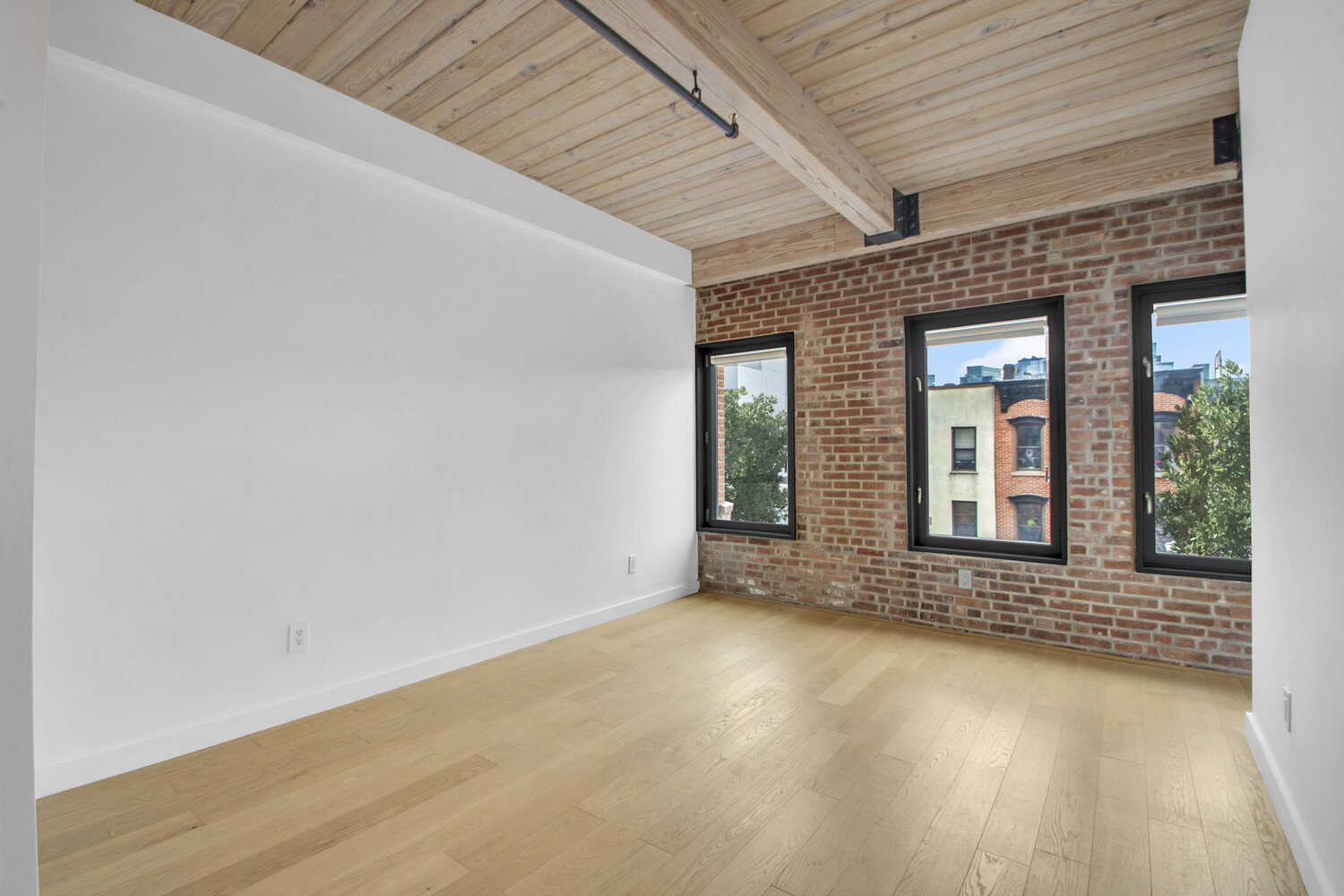 120 Java Street, Unit 4B Brooklyn, NY 11222 - Photo 13 of 48 an empty room with wooden floor and windows