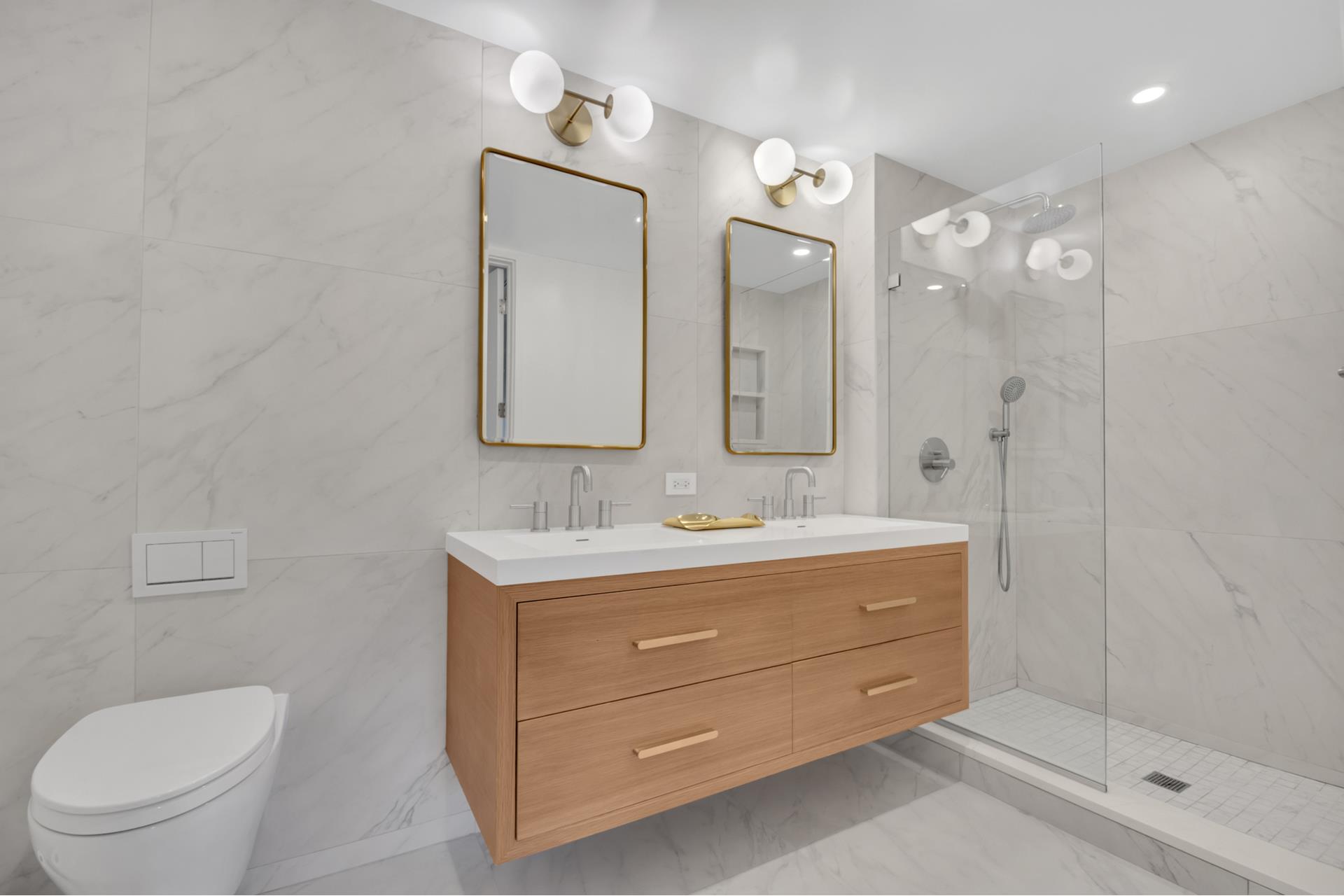 120 Java Street, Unit 4B Brooklyn, NY 11222 - Photo 14 of 27 a bathroom with a toilet a sink a mirror a shower and vanity