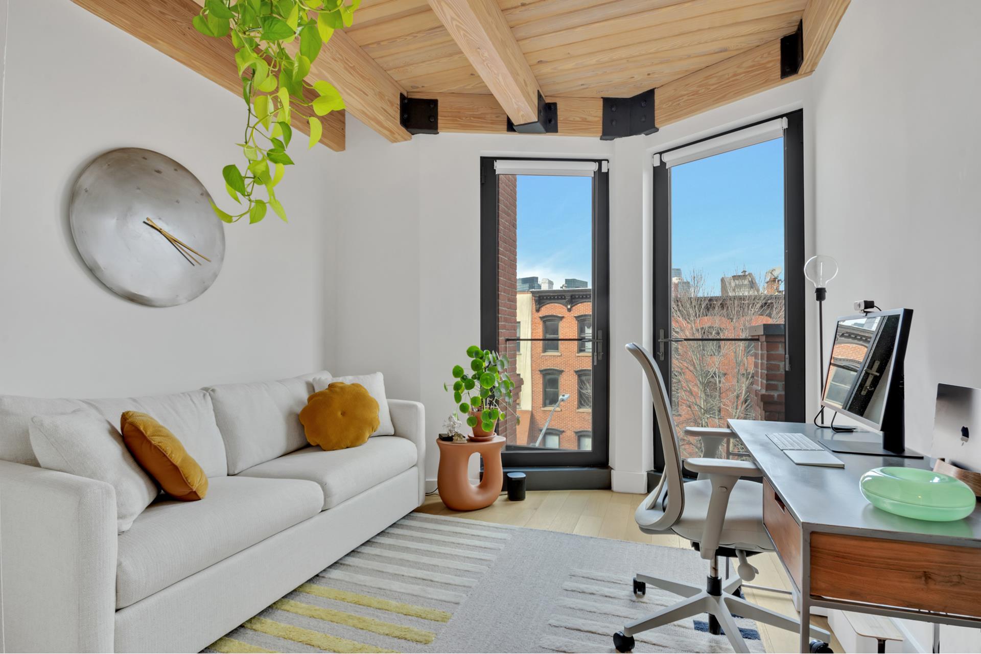 120 Java Street, Unit 4B Brooklyn, NY 11222 - Photo 16 of 27 a living room with furniture and a window