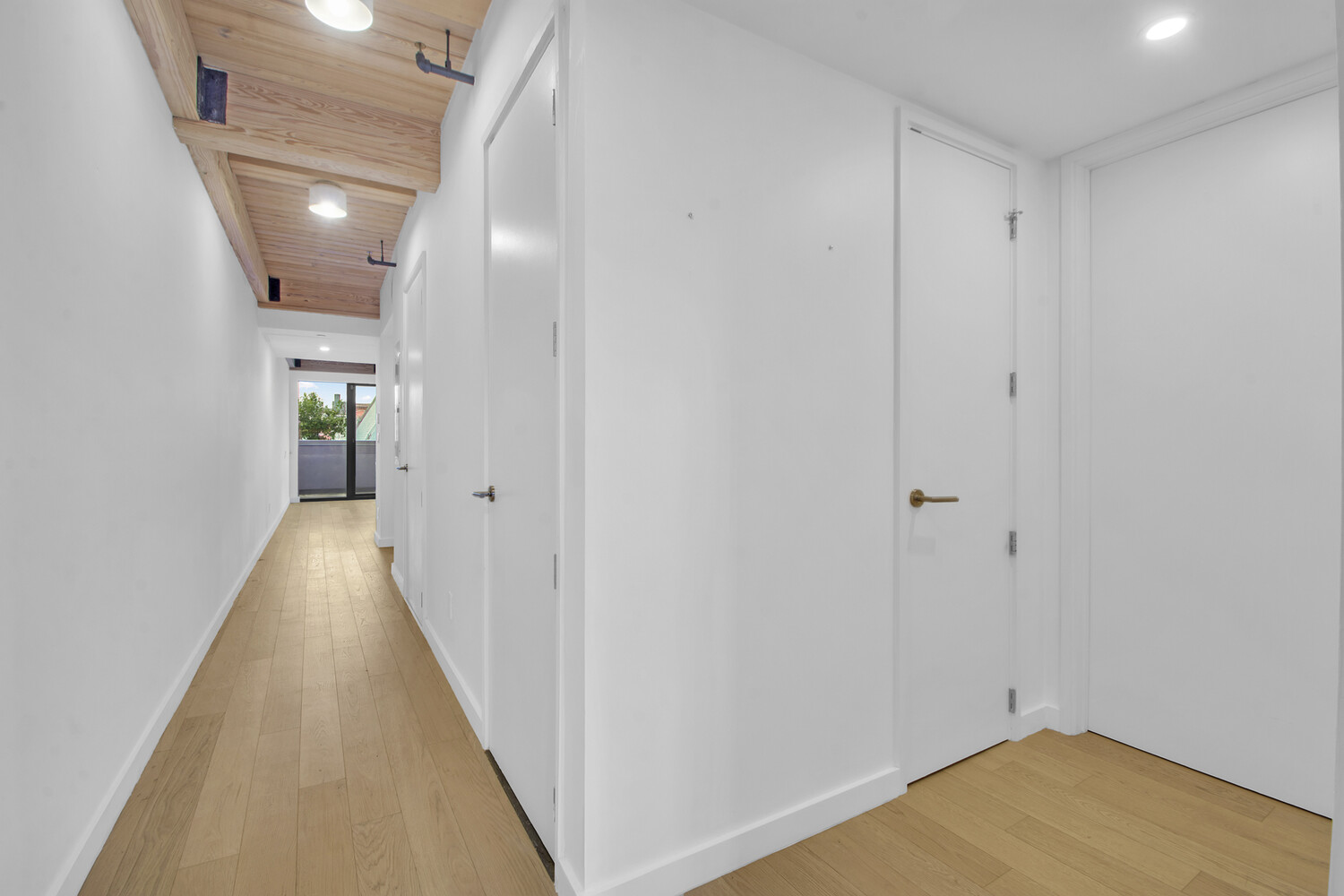 120 Java Street, Unit 4B Brooklyn, NY 11222 - Photo 19 of 48 a view of a hallway with wooden floor