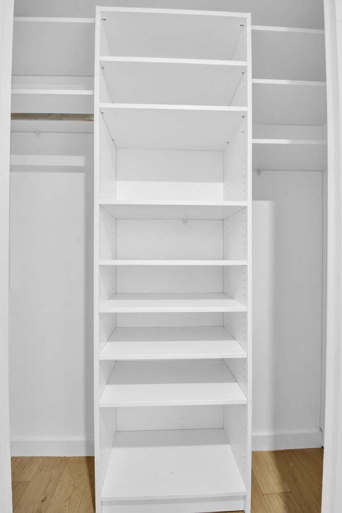 120 Java Street, Unit 4B Brooklyn, NY 11222 - Photo 23 of 48 a view of walk in closet with empty racks
