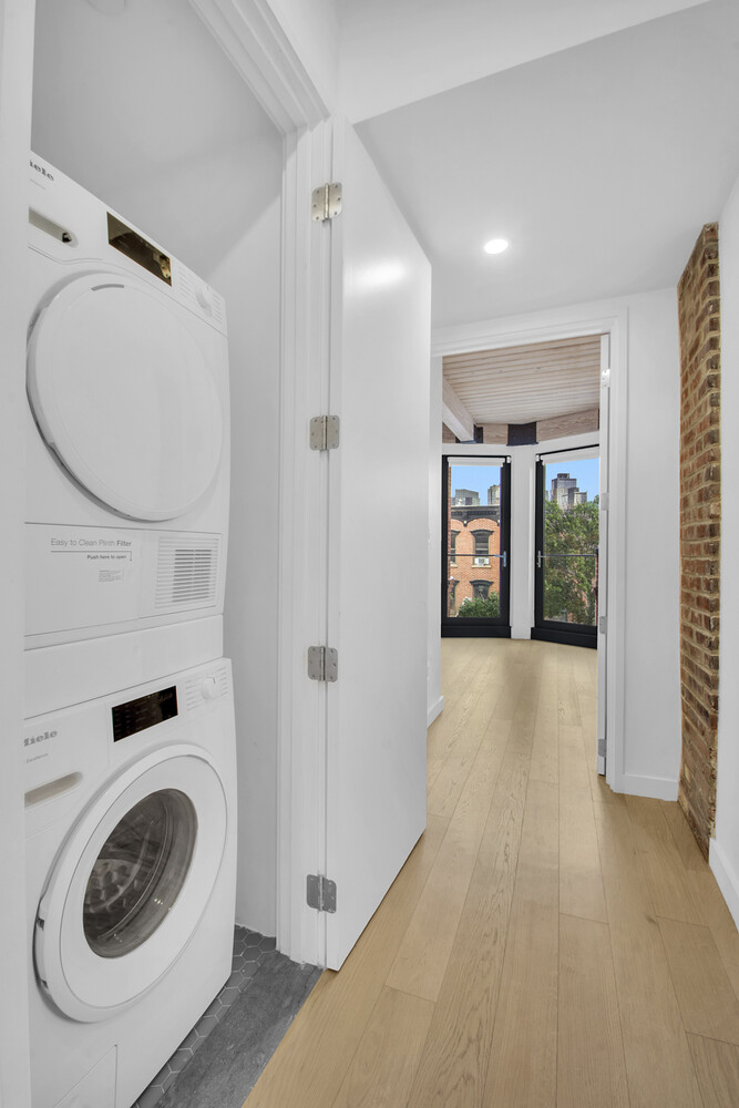 120 Java Street, Unit 4B Brooklyn, NY 11222 - Photo 24 of 48 a view of a storage & utility room with washer and dryer