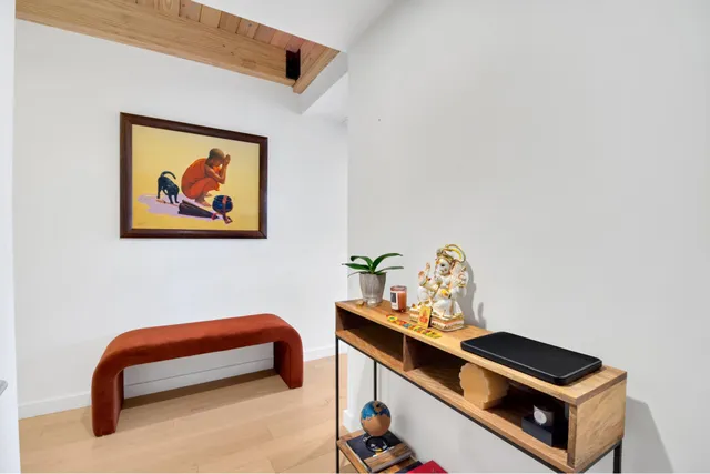 a front view of a house with furniture and window