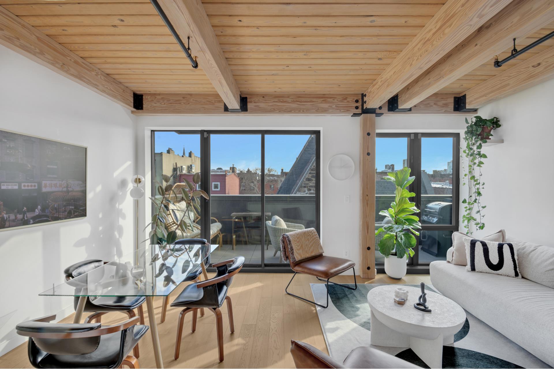 120 Java Street, Unit 4B Brooklyn, NY 11222 - Photo 29 of 48 a room with furniture and a large window