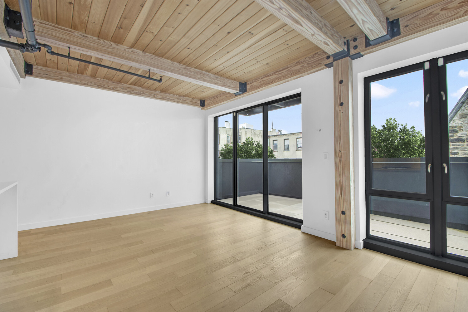 120 Java Street, Unit 4B Brooklyn, NY 11222 - Photo 7 of 48 a view of an empty room with a balcony
