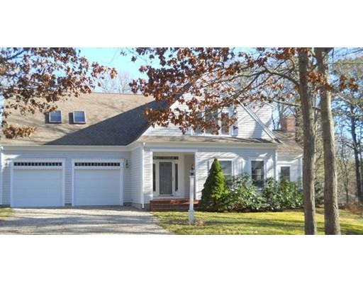 71 Fox Run, Unit CENTERVILLE Barnstable, MA 02632 - Photo 1 of 18 a house view with a garden space