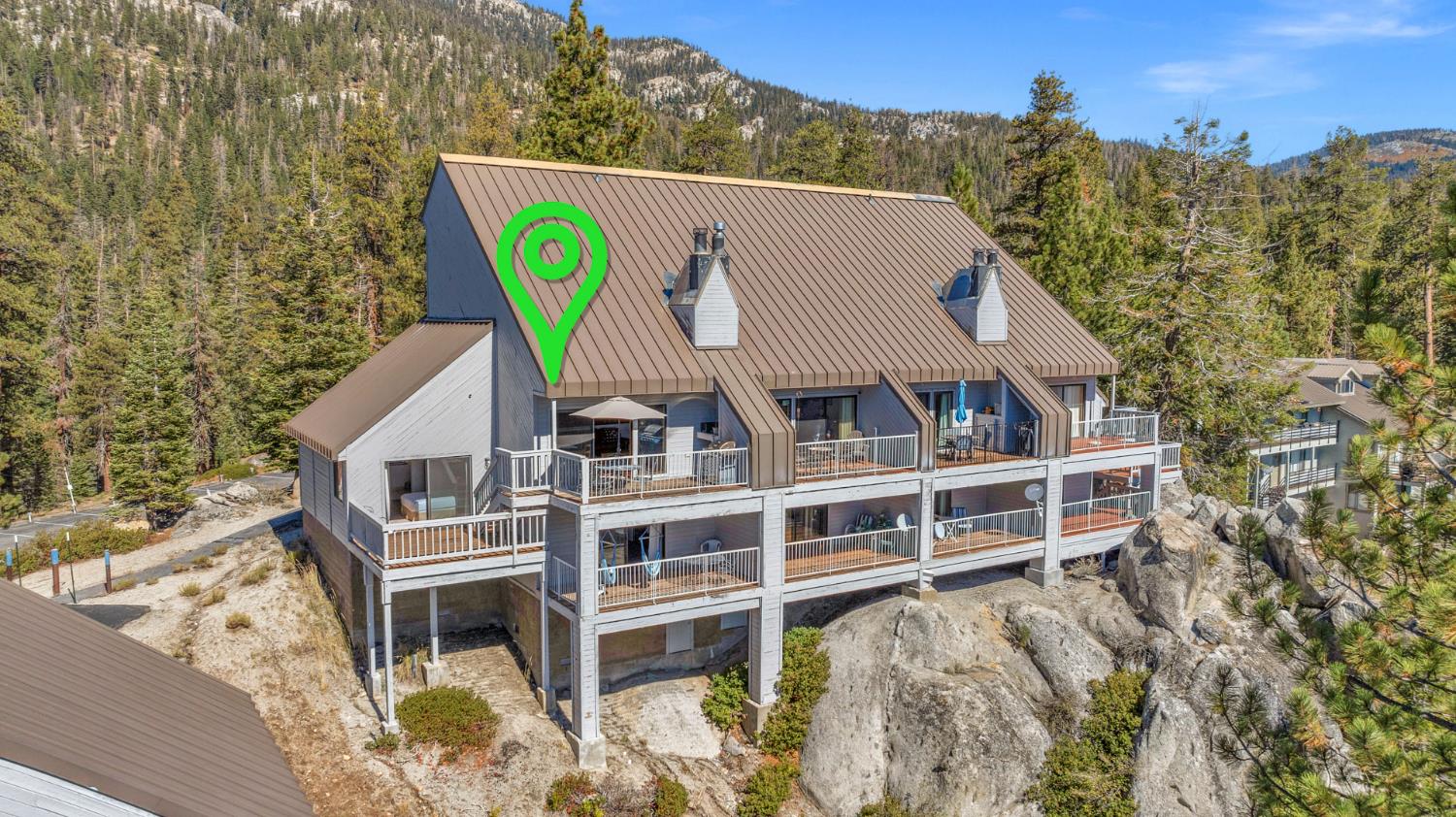 63215 Huntington Vista Road, Unit 80 Mono Hot Springs, CA 93642 - Photo 1 of 58 a aerial view of a house with a yard and parking space