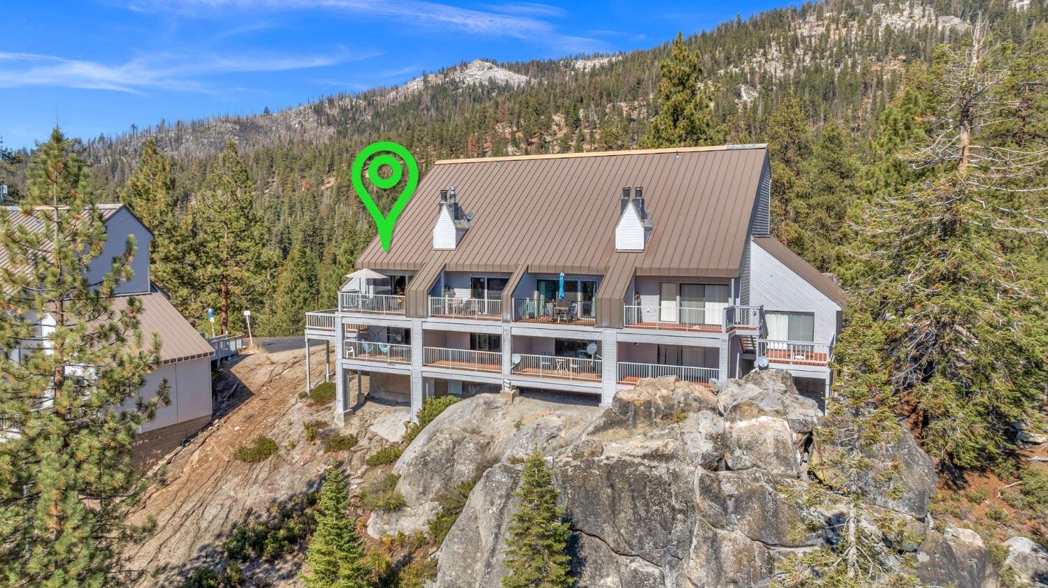 63215 Huntington Vista Road, Unit 80 Mono Hot Springs, CA 93642 - Photo 2 of 58 a view of a house with a yard